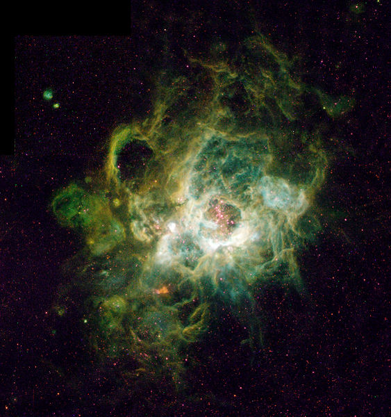 NGC604 una nube gaseosa en la que se están formando estrellas en la galaxia - photo 5