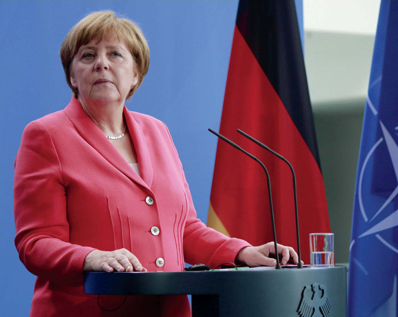 Angela Merkel en una conferencia de prensa después de una reunión con el - photo 5