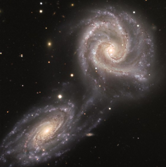 Las galaxias NGC 5426 y NGC 5427 se preparan para un abrazo que las hará bailar - photo 15
